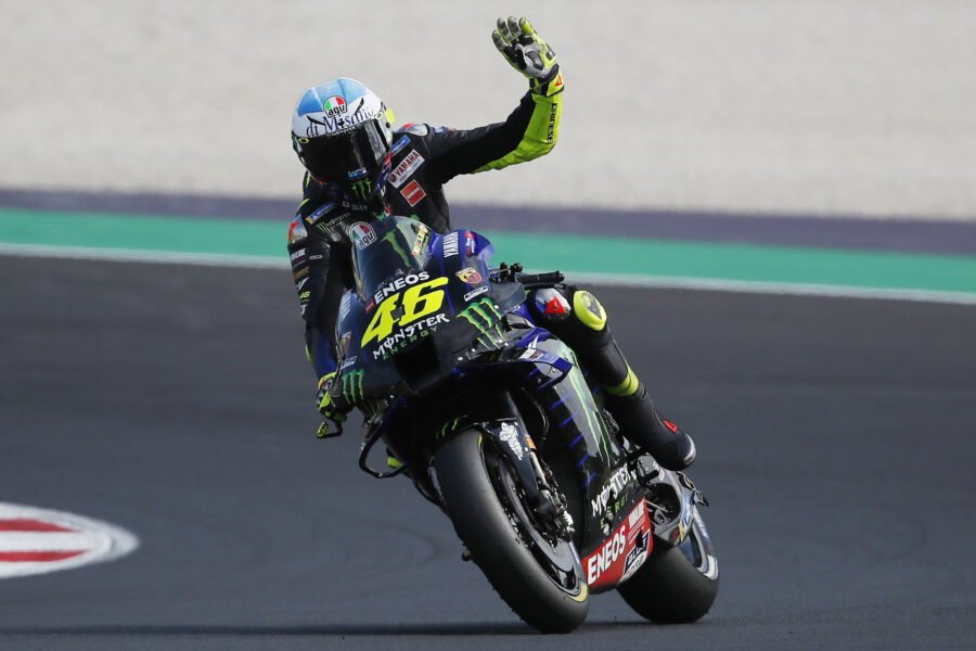 Yamaha rider Valentino Rossi, of Italy, waves his fans at the end of the qualifying session for Sunday’s Emilia Romagna Motorcycle Grand Prix at the Misano circuit in Misano Adriatico, Italy, Saturday, Sept. 19, 2020. (AP Photo/Antonio Calanni)