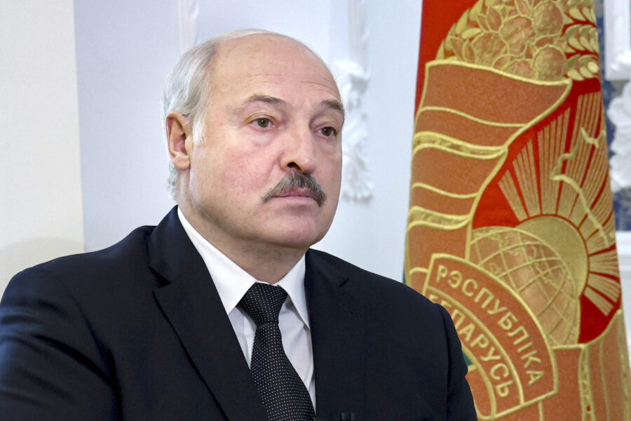 FILE – Belarusian President Aleksandr Lukashenko speaks during his interview with the Russian magazine of the Natsionalnaya Oborona (National Defense) in Minsk, Belarus, Tuesday, Nov. 9, 2021. Thousands of migrants have flocked to Belarus’ border with Poland hoping to get to Western Europe, an influx that has prompted Polish authorities to introduce a state of emergency and deploy thousands of troops and police. The European Union has accused Lukashenko of using migrants as pawns in a “hybrid attack” against the 27-nation bloc in retaliation for the EU sanctions against his government for its brutal crackdown on protests. (Nikolai Petrov/BelTA Pool Photo via AP, File)