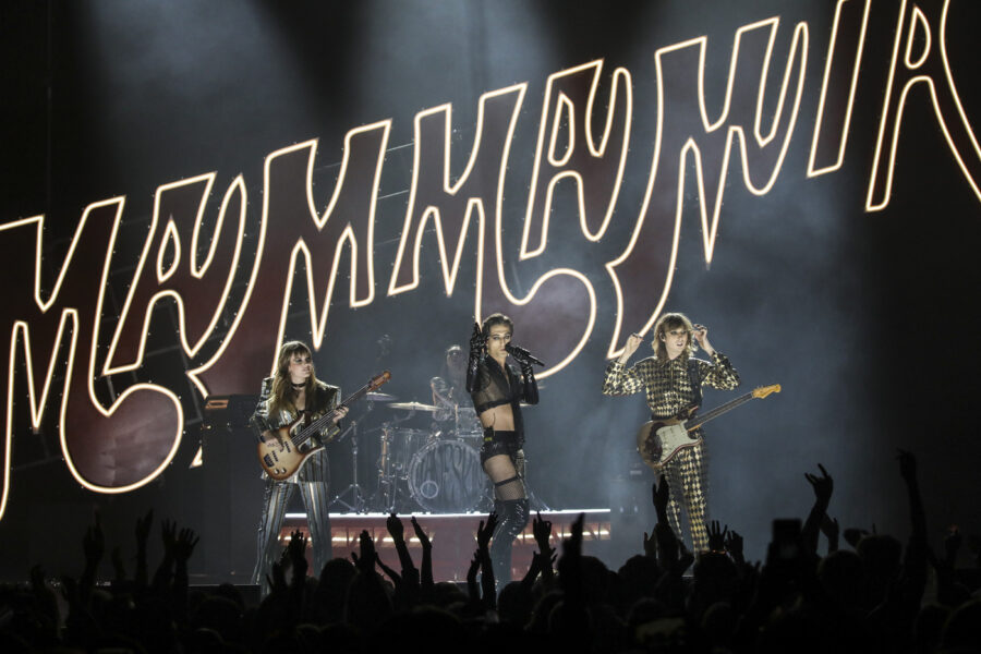 Thomas Raggi, from right, Damiano David, and Victoria De Angelis from the band Maneskin perform at the European MTV Awards in Budapest, Hungary, Sunday, Nov. 14, 2021. (Photo by Vianney Le Caer/Invision/AP)
