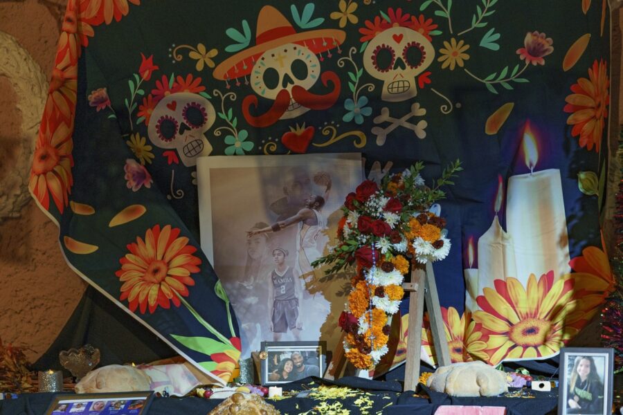 An altar for Kobe Bryant and his daughter Gigi and other victims is seen in the outdoor courtyard of the Mausoleum of Calvary Cemetery and Mortuary in East Los Angeles, Sunday, Nov. 1, 2020. They were built by nonprofit organizations, parish ministry groups, students from a Catholic school, and Archdiocese representatives. Day of the Dead, or Dia de Los Muertos, the annual Mexican tradition of reminiscing about departed loved ones with colorful altars, or ofrendas, is typically celebrated Sunday through Monday. The Dia de los Muertos celebration featured the pilgrim images of San Juan Diego, far left, and the Virgin of Guadalupe. It will undoubtedly be harder for Latino families in the U.S. torn apart by the coronavirus. This year the celebration was closed to the public due the pandemic restrictions and was livestreamed. (AP Photo/Damian Dovarganes)