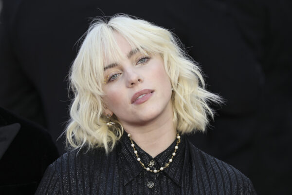 Billie Eilish poses for photographers upon arrival for the World premiere of the new film from the James Bond franchise ‘No Time To Die’, in London Tuesday, Sept. 28, 2021. (Photo by Vianney Le Caer/Invision/AP)