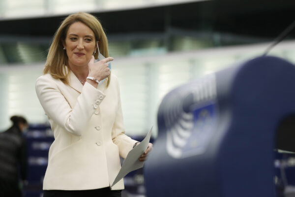 Christian Democrat Roberta Metsola of Malta arrives to deliver a speech at the European Parliament, in Strasbourg, eastern France, Tuesday, Jan 18, 2022. Metsola was elected president of the European Union’s parliament Tuesday, taking over for a 2 ½-year term following the death of Socialist David Sassoli last week. (AP Photo/Jean-Francois Badias)