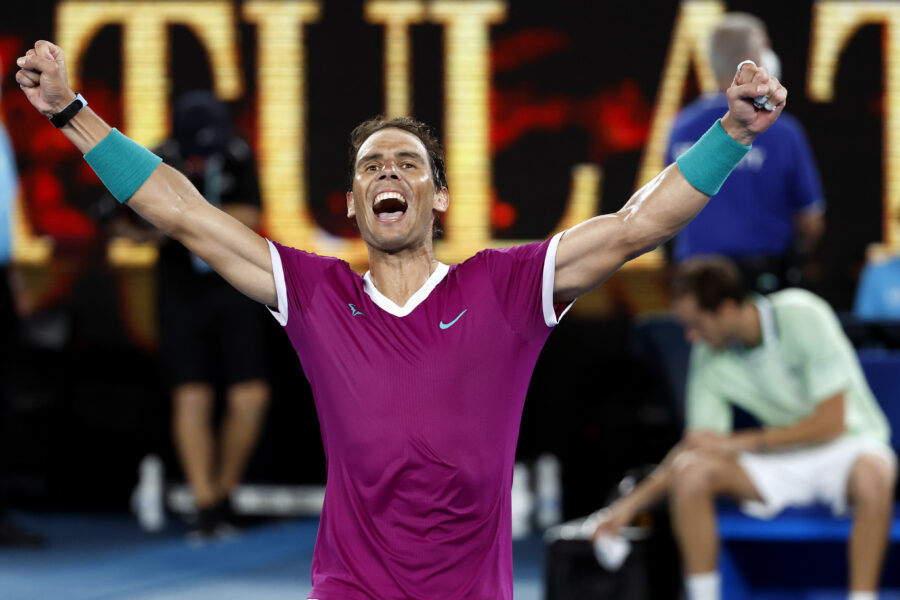 Rafael Nadal of Spain celebrates his win over Daniil Medvedev of Russia in the men’s singles final at the Australian Open tennis championships in Melbourne, Australia, early Monday, Jan. 31, 2022. (AP Photo/Hamish Blair)