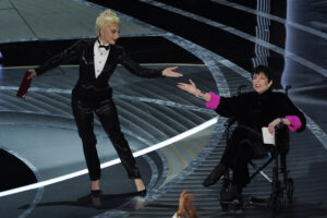 Lady Gaga, left, and Liza Minnelli present the award for best picture at the Oscars on Sunday, March 27, 2022, at the Dolby Theatre in Los Angeles. (AP Photo/Chris Pizzello)