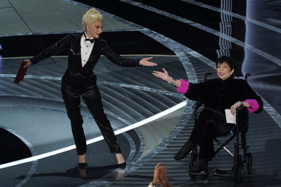 Lady Gaga, left, and Liza Minnelli present the award for best picture at the Oscars on Sunday, March 27, 2022, at the Dolby Theatre in Los Angeles. (AP Photo/Chris Pizzello)