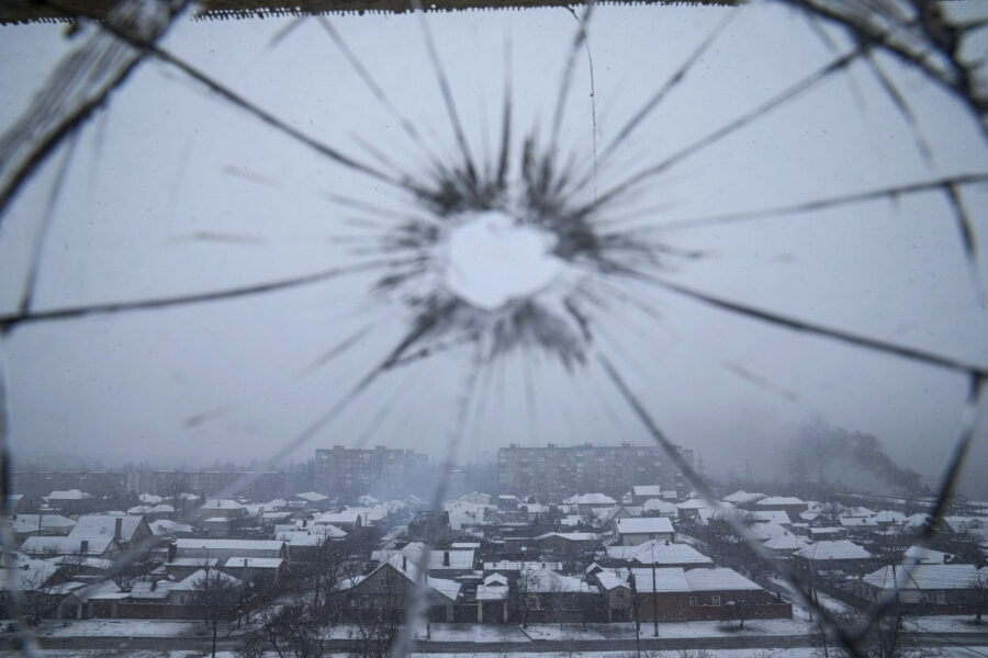 A hospital window is cracked from shelling in Mariupol, Ukraine, Thursday, March 3, 2022. (AP Photo/Evgeniy Maloletka)