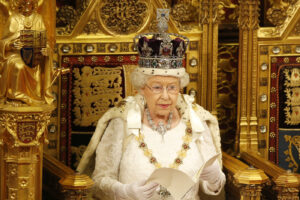 FILE – Britain’s Queen Elizabeth II reads the Queen’s Speech from the throne during the State Opening of Parliament in the House of Lords in London, Wednesday, May, 18, 2016. Queen Elizabeth II is marking her 96th birthday privately on Thursday, April 21, 2022 retreating to the Sandringham estate in eastern England that has offered the monarch and her late husband, Prince Philip, a refuge from the affairs of state. (AP Photo/Alastair Grant, File)