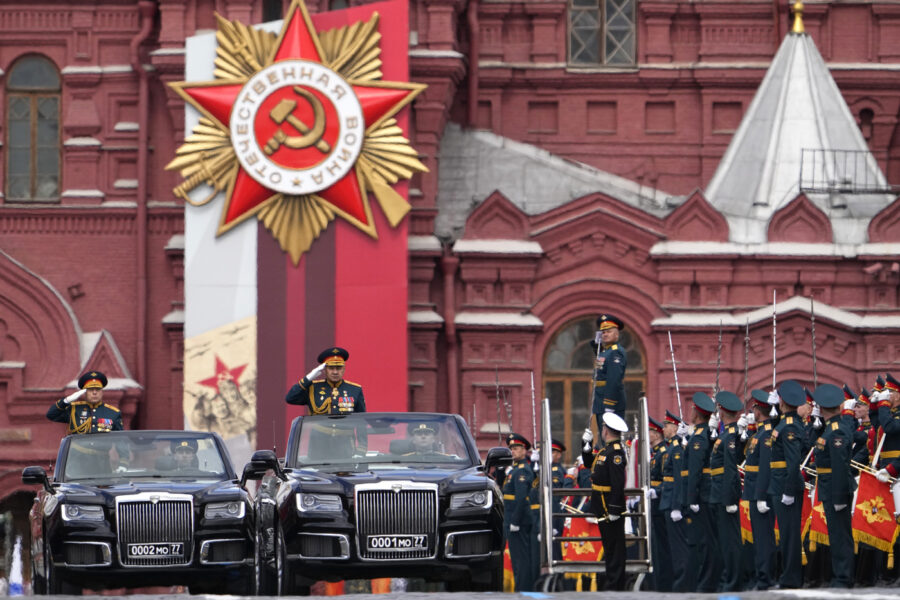 Russian Defense Minister Sergei Shoigu salutes to his soldiers as he is driven along Red Square in the Aurus Senat car during the Victory Day military parade in Moscow, Russia, Monday, May 9, 2022, marking the 77th anniversary of the end of World War II. (AP Photo/Alexander Zemlianichenko)