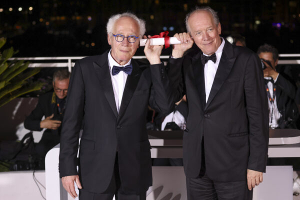 Directors Luc Dardenne, left, and Jean-Pierre Dardenne, winners of the 75th anniversary prize for ‘Tori and Lokia’ pose for photographers during the photo call following the awards ceremony at the 75th international film festival, Cannes, southern France, Saturday, May 28, 2022. (Photo by Vianney Le Caer/Invision/AP)