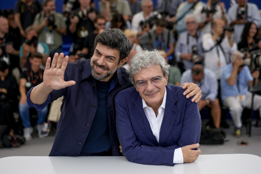 Pierfrancesco Favino, left, and director Mario Martone pose for photographers at the photo call for the film ‘Nostalgia’ at the 75th international film festival, Cannes, southern France, Wednesday, May 25, 2022. (AP Photo/Daniel Cole)