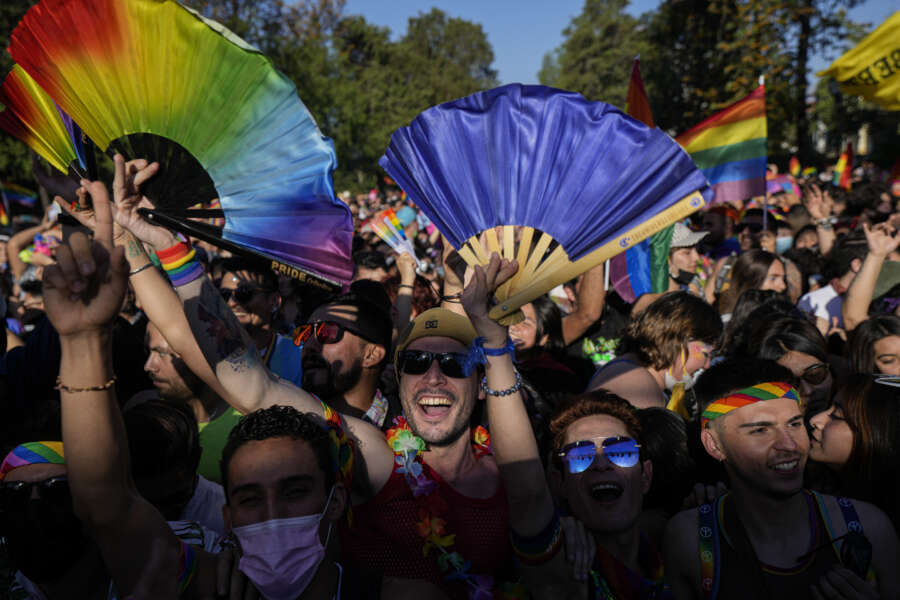 People celebrate during the annual Gay Pride parade in Santiago, Chile, Saturday, Nov. 13, 2021. (AP Photo/Esteban Felix)
