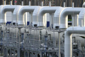 FILE – Pipes at the landfall facilities of the ‘Nord Stream 2’ gas pipline are pictured in Lubmin, northern Germany, Tuesday, Feb. 15, 2022. It’s not a summer heat wave that’s making European leaders and businesses sweat. It’s fear that Russia’s manipulation of natural gas supplies will lead to an economic and political crisis next winter. Or, in the worst case, even sooner. (AP Photo/Michael Sohn, File)