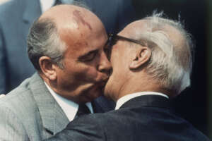 FILE – Soviet Communist Party leader Mikhail Gorbachev, left, and East Germany’s state and Communist party leader Erich Honecker exchange kisses at East Berlin’s Schoenefeld airport on Wednesday May 27, 1987. Russian news agencies are reporting that former Soviet President Mikhail Gorbachev has died at 91. The Tass, RIA Novosti and Interfax news agencies cited the Central Clinical Hospital. (AP Photo, File)