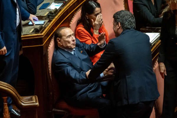 Foto Mauro Scrobogna/LaPresse 
13-10-2022 Roma (Italia) Politica – Senato prima seduta della XIX legislatura – elezione Presidente – Nella foto: il leader di Forza Italia FI Silvio Berlusconi rientra nell’ Aula del Senato dopo quasi nove anni dal voto che il 27.11.2013 lo dichiarò decaduto dalla carica di Senatore, con Matteo Renzi

10-13-2022 Rome (Italy) Politics –  Senate first session of the 19th legislature – President election – In the photo: Forza Italia FI leader Silvio Berlusconi returns to the Senate chamber after almost nine years from the vote that on 27.11.2013 declared him forfeited from the office of Senator, with Matteo Renzi
