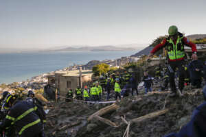 Rescuers work after heavy rainfall triggered landslides that collapsed buildings, in Casamicciola, on the southern Italian island of Ischia, Monday, Nov. 28, 2022. Authorities said that the landslide that early Saturday destroyed buildings and swept parked cars into the sea left at least eight people dead and more missing. (AP Photo/Salvatore Laporta) 

Associated Press/LaPresse