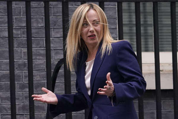Italian Prime Minister Giorgia Meloni arrives to 10 Downing Street to meet Britain’s Prime Minister Rishi Sunak in London, Thursday, April 27, 2023.(AP Photo/Alberto Pezzali)
