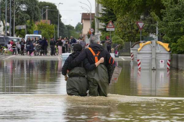 A couple walk in a flooded road of Lugo, Italy, Thursday, May 18, 2023. Exceptional rains Wednesday in a drought-struck region of northern Italy swelled rivers over their banks, killing at least eight people, forcing the evacuation of thousands and prompting officials to warn that Italy needs a national plan to combat climate change-induced flooding. (AP Photo/Luca Bruno)

Associated Press/LaPresse
Only Italy and Spain