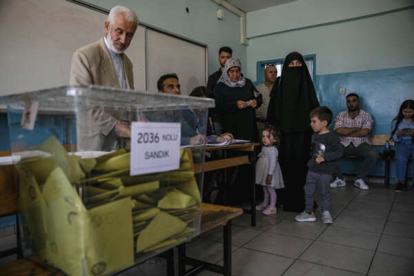People at a polling station in Diyarbakir, Turkey, Sunday, May 14, 2023. Election polls have closed Sunday in Turkey, where President Recep Tayyip Erdogan’s leadership  hung in the balance after a strong challenge from an opposition candidate. (AP Photo/Metin Yoksu)