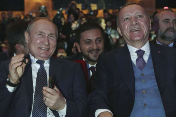 Turkish President Recep Tayyip Erdogan, right, and Russian President Vladimir Putin smile during a ceremony for the dual natural gas line, TurkStream, connecting their countries, in Istanbul, Wednesday, Jan. 8, 2020. Putin and Erdogan inaugurated the natural gas line that will open up a new export path for Russian gas into Turkey and Europe. Erdogan and Putin are also expected to discuss Syria and Libya, where the two leaders support opposing sides, while addressing regional tensions in Iraq and Iran, which have escalated with the American killing of a top Iranian commander. (Presidential Press Service via AP, Pool) Turkish President Recep Tayyip Erdogan, right, and Russian President Vladimir Putin smile during a ceremony for the dual natural gas line, TurkStream, connecting their countries, in Istanbul, Wednesday, Jan. 8, 2020. Putin and Erdogan inaugurated the natural gas line that will open up a new export path for Russian gas into Turkey and Europe. Erdogan and Putin are also expected to discuss Syria and Libya, where the two leaders support opposing sides, while addressing regional tensions in Iraq and Iran, which have escalated with the American killing of a top Iranian commander. (Presidential Press Service via AP, Pool)