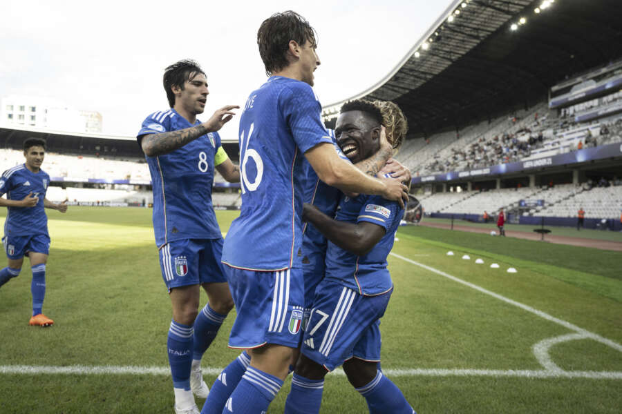 Italy’s Wilfried Gnonto, celebrates with his teammates after scoring his side’s second goal during the Under 21 European Championships soccer match between Switzerland and Italy, in the Cluj Arena in Cluj-Napoca, Romania, Sunday June 25, 2023. (Georgios Kefalas/Keystone via AP)