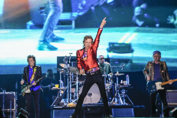 Mick Jagger, centre, Ronnie Wood, left, and Keith Richards, right, of the band the Rolling Stones, perform during their Sixty Stones Europe 2022 tour at the Wanda Metropolitano stadium in Madrid, Spain, Wednesday, June 1, 2022. (AP Photo/Manu Fernandez) Mick Jagger, centre, Ronnie Wood, left, and Keith Richards, right, of the band the Rolling Stones, perform during their Sixty Stones Europe 2022 tour at the Wanda Metropolitano stadium in Madrid, Spain, Wednesday, June 1, 2022. (AP Photo/Manu Fernandez)