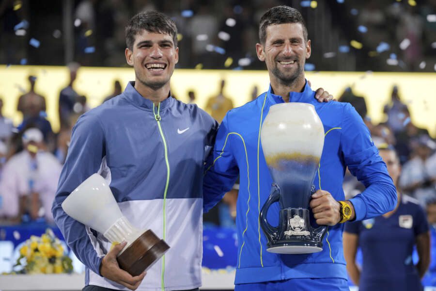 Novak Djokovic, right, of Serbia, poses with Carlos Alcaraz, left, of Spain, for photos after the men’s singles final of the Western & Southern Open tennis tournament, Sunday, Aug. 20, 2023, in Mason, Ohio. (AP Photo/Aaron Doster) 



LaPresse Only italy and Spain
