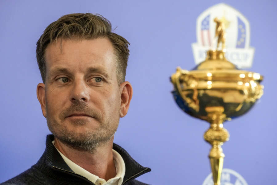 2023 Europe Ryder Cup golf captain Henrik Stenson looks at the Ryder Cup Trophy during a press conference, at the Marco Simone golf club, in Guidonia Montecelio, outskirts of Rome, Monday, May 30, 2022. (AP Photo/Andrew Medichini)