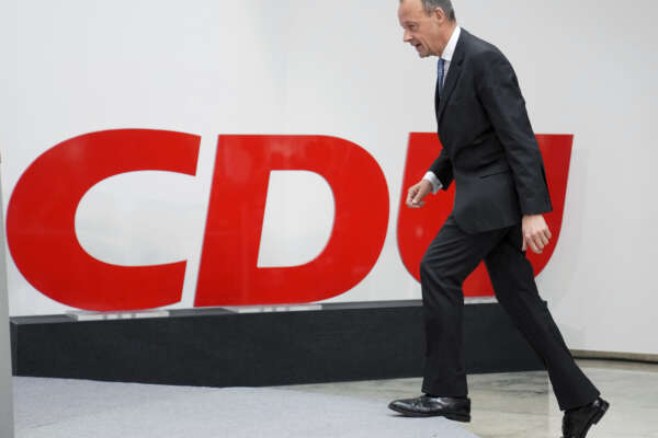 The Chairman of the German Christian Democratic Party (CDU), Friedrich Merz, arrives for a press conference at the party’s headquarters in Berlin, Germany, Monday, March 28, 2022 the day after the state elections in the German state of Saarland. (AP Photo/Michael Sohn, pool)