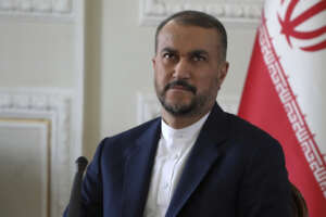 Iranian Foreign Minister Hossein Amirabollahian sits at his press conference in Tehran, Iran, Sunday, March 19, 2023. (AP Photo/Vahid Salemi)