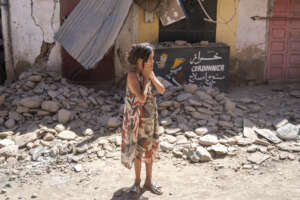 A child reacts after inspecting the damage caused by the earthquake, in her town of Amizmiz, near Marrakech, Morocco, Sunday, Sept. 10, 2023. An aftershock rattled Moroccans on Sunday as they prayed for victims of the nation’s strongest earthquake in more than a century and toiled to rescue survivors while soldiers and workers brought water and supplies to desperate mountain villages in ruins. (AP Photo/Mosa’ab Elshamy) A child reacts after inspecting the damage caused by the earthquake, in her town of Amizmiz, near Marrakech, Morocco, Sunday, Sept. 10, 2023. An aftershock rattled Moroccans on Sunday as they prayed for victims of the nation’s strongest earthquake in more than a century and toiled to rescue survivors while soldiers and workers brought water and supplies to desperate mountain villages in ruins. (AP Photo/Mosa’ab Elshamy)