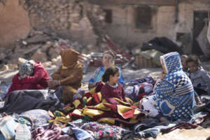 CORRECTS NAME OF VILLAGE Families sit outside their destroyed homes after an earthquake in Moulay Brahim village, near Marrakech, Morocco, Saturday, Sept. 9, 2023. A rare, powerful earthquake struck Morocco late Friday night, killing more than 800 people and damaging buildings from villages in the Atlas Mountains to the historic city of Marrakech. But the full toll was not known as rescuers struggled to get through boulder-strewn roads to the remote mountain villages hit hardest. (AP Photo/Mosa’ab Elshamy)
Associated Press/LaPresse
Only Italy and Spain CORRECTS NAME OF VILLAGE Families sit outside their destroyed homes after an earthquake in Moulay Brahim village, near Marrakech, Morocco, Saturday, Sept. 9, 2023. A rare, powerful earthquake struck Morocco late Friday night, killing more than 800 people and damaging buildings from villages in the Atlas Mountains to the historic city of Marrakech. But the full toll was not known as rescuers struggled to get through boulder-strewn roads to the remote mountain villages hit hardest. (AP Photo/Mosa’ab Elshamy)
Associated Press/LaPresse
Only Italy and Spain