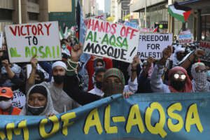 South Africans protest against Israeli attacks on Palestinians in Gaza, outside parliament in Cape Town, South Africa, Wednesday, May 12, 2021. Violence escalated between Israel and Palestine sparked by unrest at Jerusalem’s flashpoint Al-Aqsa Mosque. (AP Photo/Nardus Engelbrecht) South Africans protest against Israeli attacks on Palestinians in Gaza, outside parliament in Cape Town, South Africa, Wednesday, May 12, 2021. Violence escalated between Israel and Palestine sparked by unrest at Jerusalem’s flashpoint Al-Aqsa Mosque. (AP Photo/Nardus Engelbrecht)