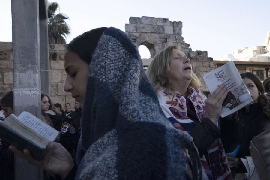 Anat Hoffman, center right, of Women of the Wall stands near a Jewish religious student as she sings during the group’s Rosh Hodesh prayer marking the new month, at the Western Wall, the holiest site where Jews can pray, in the Old City of Jerusalem, Monday, Jan. 23, 2023. The group has waged a decades-long campaign for gender equality at the holy site. (AP Photo/ Maya Alleruzzo)

Associated Press/LaPresse
Only Italy and Spain