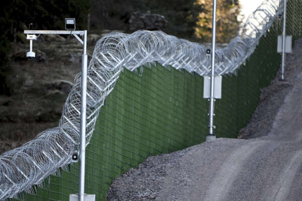 The pilot border fence during the media event of the Finnish Border Guard RAJA at the Finnish – Russian border in Imatra, Finland, Thursday, Oct. 26, 2023. (Jussi Nukari/Lehtikuva via AP)