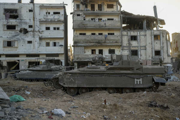 An Israeli armored personnel carrier and a tank are seen next to destroyed buildings during a ground operation in the Gaza Strip on Wednesday, Nov. 8, 2023. Israeli ground forces entered the Gaza Strip as they press ahead with their war against Hamas militants in retaliation for the group’s unprecedented Oct. 7 attack on Israel. (AP Photo/Ohad Zwigenberg)


Associated Press/LaPresse
Only Italy and Spain