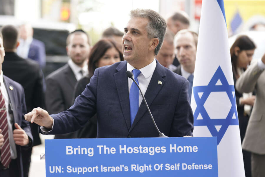Israeli Foreign Minister Eli Cohen speaks about Israeli hostages being held by Hamas in front of United Nations headquarters in New York, Tuesday, Oct. 24, 2023. (AP Photo/Seth Wenig)