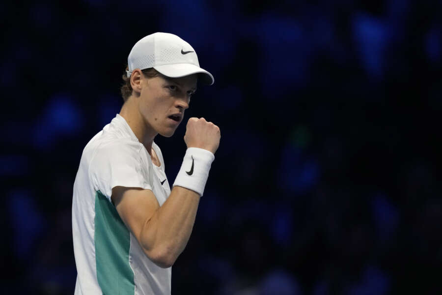 Italy’s Jannik Sinner reacts during the singles tennis match against Greece’s Stefanos Tsitsipas, of the ATP World Tour Finals at the Pala Alpitour, in Turin, Italy, Sunday, Nov. 12, 2023. (AP Photo/Antonio Calanni)