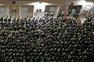 Acca Larentia, saluto romano