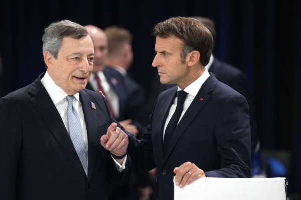 French President Emmanuel Macron, right, speaks with Italian Prime Minister Mario Draghi during a round table meeting at a NATO summit in Madrid, Spain on Wednesday, June 29, 2022. North Atlantic Treaty Organization heads of state meet for a NATO summit in Madrid from Tuesday through Thursday. (AP Photo/Manu Fernandez) French President Emmanuel Macron, right, speaks with Italian Prime Minister Mario Draghi during a round table meeting at a NATO summit in Madrid, Spain on Wednesday, June 29, 2022. North Atlantic Treaty Organization heads of state meet for a NATO summit in Madrid from Tuesday through Thursday. (AP Photo/Manu Fernandez)