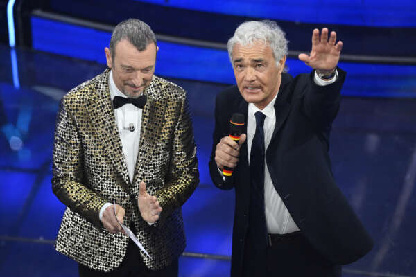 Amadeus and Massimo Giletti during the 74th edition of the SANREMO Italian Song Festival at the Ariston Theatre in Sanremo, northern Italy – Thursday, FEBRUARY 8, 2024. Entertainment. (Photo by Marco Alpozzi/LaPresse) Amadeus and Massimo Giletti during the 74th edition of the SANREMO Italian Song Festival at the Ariston Theatre in Sanremo, northern Italy – Thursday, FEBRUARY 8, 2024. Entertainment. (Photo by Marco Alpozzi/LaPresse)