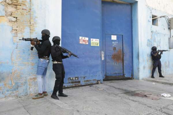 National Police stand guard outside the empty National Penitentiary after a small fire inside in downtown Port-au-Prince, Haiti, Haiti, Thursday, March 14, 2024. This is the same facility that armed gangs stormed late March 2 and hundreds of inmates escaped. (AP Photo/Odelyn Joseph) 



Associated Press / LaPresse
Only italy and Spain