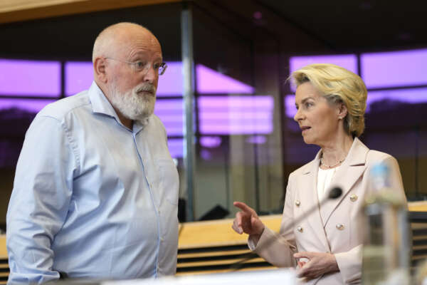 European Commission President Ursula von der Leyen, right, speaks with European Commissioner for European Green Deal Frans Timmermans during the weekly College of Commissioners meeting at EU headquarters in Brussels on Wednesday, July 20, 2022. European Union Commissioners started to put the finishing touches early Wednesday on a drastic plan to make sure that any Russian cut off of its vast natural gas supplies to the bloc will not disrupt industries and send an additional chill through homes next winter. (AP Photo/Virginia Mayo) European Commission President Ursula von der Leyen, right, speaks with European Commissioner for European Green Deal Frans Timmermans during the weekly College of Commissioners meeting at EU headquarters in Brussels on Wednesday, July 20, 2022. European Union Commissioners started to put the finishing touches early Wednesday on a drastic plan to make sure that any Russian cut off of its vast natural gas supplies to the bloc will not disrupt industries and send an additional chill through homes next winter. (AP Photo/Virginia Mayo)