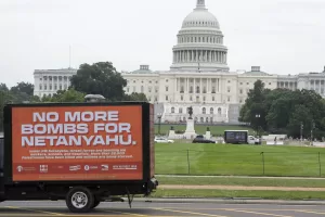 IMAGE DISTRIBUTED FOR OXFAM AMERICA – A No More Bombs for Netanyahu mobile billboard is seen near the Capitol building on Tuesday, July 23, 2024 in Washington. Oxfam America, Win Without War, American Friends of Combatants for Peace, Indivisible, Middle East Democracy Center and SEIU, sponsor a mobile billboard with the message NO MORE BOMBS FOR NETENYAHU to circle the US Capitol before Israeli Prime Minister Benjamin Netanyahu speaks on Wednesday to a joint session of Congress. (Kevin Wolf/AP Content Services for Oxfam America) IMAGE DISTRIBUTED FOR OXFAM AMERICA – A No More Bombs for Netanyahu mobile billboard is seen near the Capitol building on Tuesday, July 23, 2024 in Washington. Oxfam America, Win Without War, American Friends of Combatants for Peace, Indivisible, Middle East Democracy Center and SEIU, sponsor a mobile billboard with the message NO MORE BOMBS FOR NETENYAHU to circle the US Capitol before Israeli Prime Minister Benjamin Netanyahu speaks on Wednesday to a joint session of Congress. (Kevin Wolf/AP Content Services for Oxfam America)