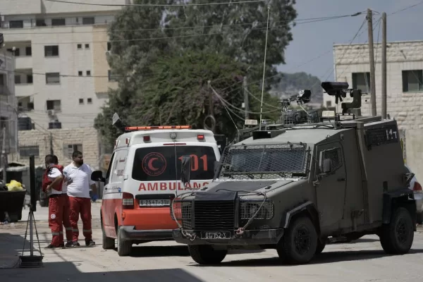 Members of the Israeli forces inside an armoured vehicle check an ambulance during a military operation in the West Bank city of Jenin, Wednesday, Aug. 28, 2024. (AP Photo/Majdi Mohammed) Members of the Israeli forces inside an armoured vehicle check an ambulance during a military operation in the West Bank city of Jenin, Wednesday, Aug. 28, 2024. (AP Photo/Majdi Mohammed)