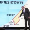 Israeli Prime Minister Benjamin Netanyahu stands before a map of the Gaza Strip, telling viewers that Israel must retain control over the "Philadelphi corridor," a strategic area along the territory’s border with Egypt, during a news conference in Jerusalem, Monday, Sept. 2, 2024. The Hebrew on the screen reads, "Philadelphi corridor under Israeli military control." (AP Photo/Ohad Zwigenberg, Pool)