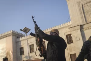 An opposition fighter fires his AK-47 in the air in celebration in Hama, Syria, Friday Dec. 6, 2024.(AP Photo/Omar Albam) 


Associated Press / LaPresse
Only italy and Spain
