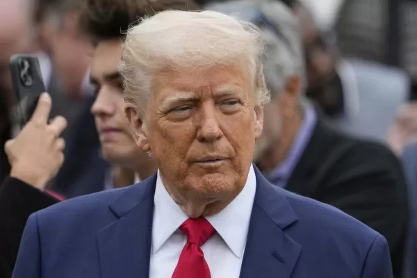 President Donald Trump watches during the White House Easter Egg Roll on the South Lawn of the White House, Monday, April 21, 2025, in Washington. (AP Photo/Alex Brandon)