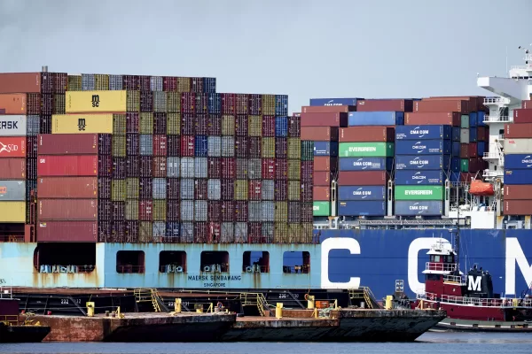 A container ship passes another at the Port of New York and New Jersey in Elizabeth, as seen from Bayonne, N.J., Thursday, May 20, 2021. (AP Photo/Seth Wenig)