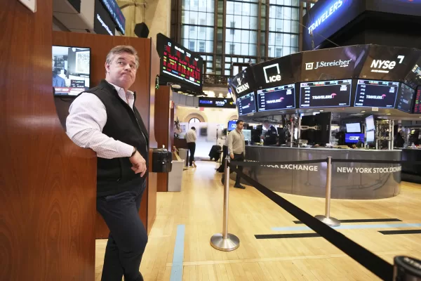 Traders work on the floor at the New York Stock Exchange in New York, Monday, April 7, 2025. (AP Photo/Seth Wenig)
