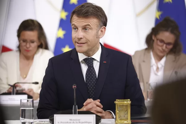 French President Emmanuel Macron chairs a meeting with representatives of the sectors affected by new tariffs announced by President Donald Trump, Thursday, April 3, 2025 at the Elysee Palace in Paris. (Mohammed Badra, Pool via AP)